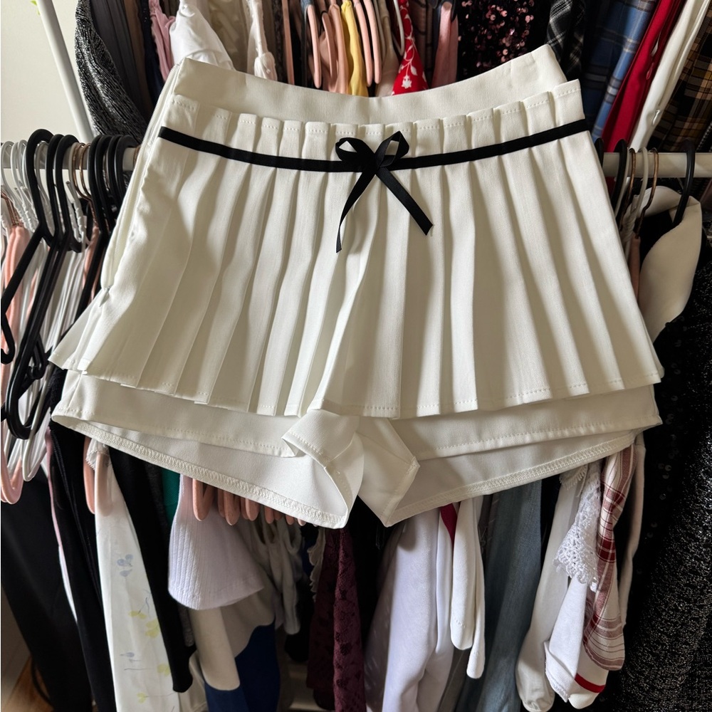 Women's White Pleated Shorts with Black Ribbon